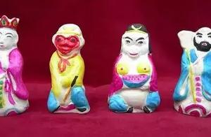 竹篮寨泥塑，憨态可掬