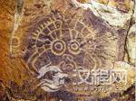 宁夏山洪后现7幅远古新岩画 多为人面画像